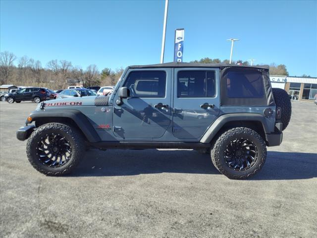 Photo of 2014 Anvil Clear Coat Jeep Wrangler Unlimited