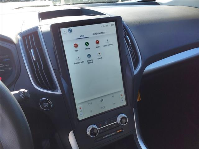 Photo of 2024 Atlas Blue Metallic Ford Edge