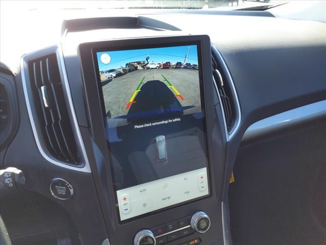 Photo of 2024 Atlas Blue Metallic Ford Edge