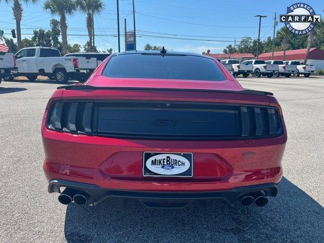 Photo of 2021 Burgundy Ford Mustang