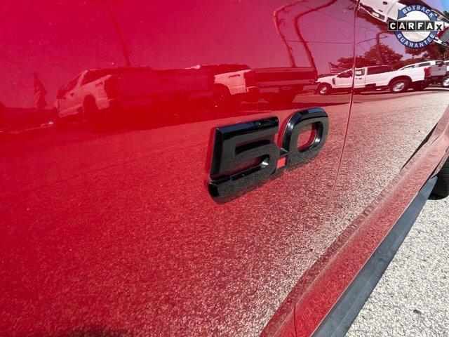 Photo of 2021 Burgundy Ford Mustang