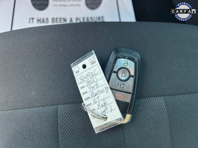Photo of 2021 Burgundy Ford Mustang