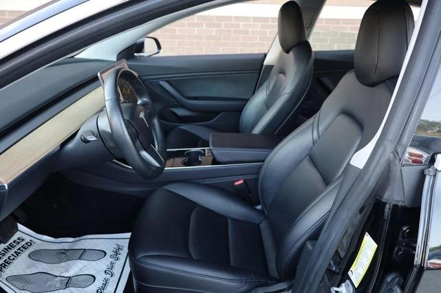 Photo of 2018 Black Tesla Model 3