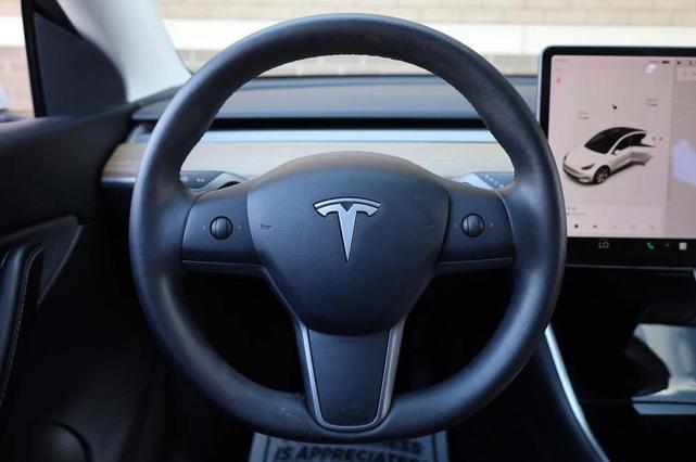 Photo of 2021 Pearl White Multi-Coat Tesla Model Y