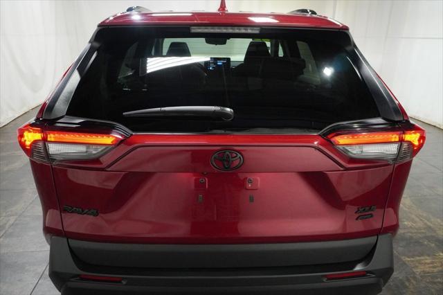 Photo of 2023 Ruby Flare Pearl Toyota RAV4