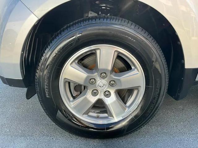 Photo of 2010 Polished Metal Metallic Honda Pilot