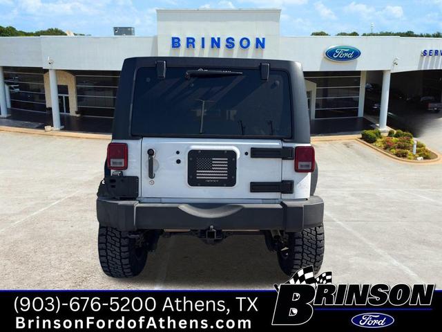Photo of 2017 Bright White Clearcoat Jeep Wrangler Unlimited