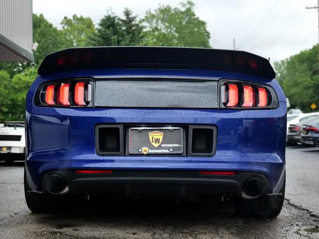 Photo of 2014 Deep Impact Blue Ford Mustang