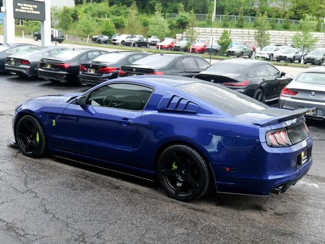 Photo of 2014 Deep Impact Blue Ford Mustang