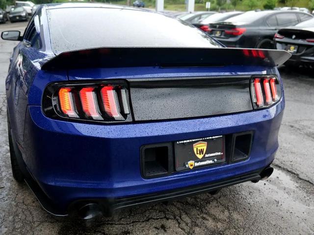 Photo of 2014 Deep Impact Blue Ford Mustang