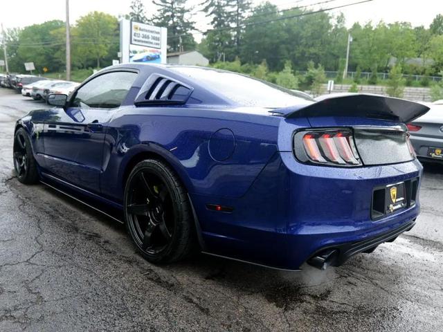 Photo of 2014 Deep Impact Blue Ford Mustang