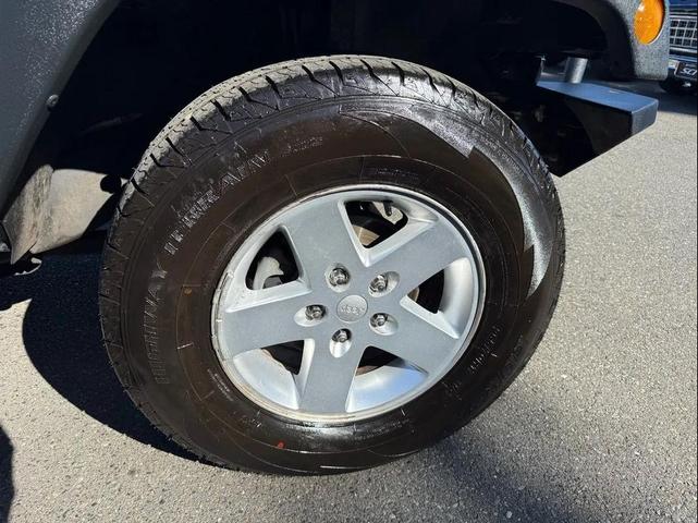 Photo of 2014 Black Clearcoat Jeep Wrangler Unlimited