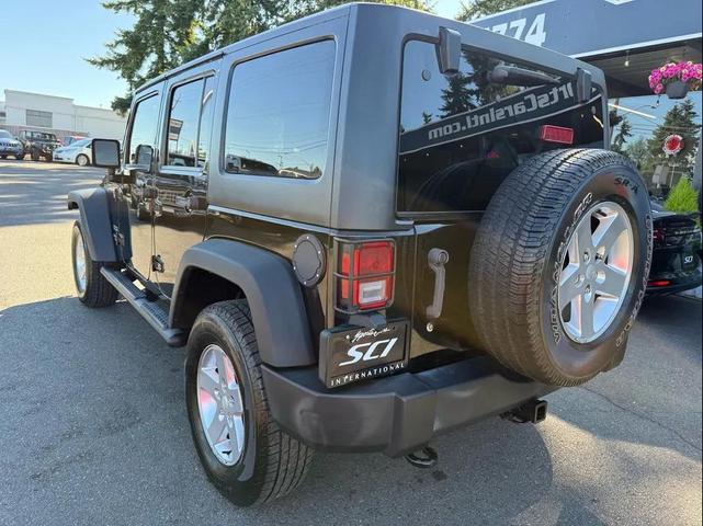 Photo of 2014 Black Clearcoat Jeep Wrangler Unlimited