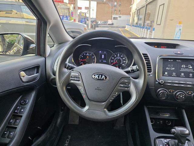 Photo of 2018 Garnet Red Kia Forte