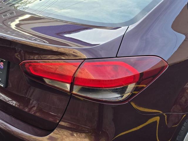 Photo of 2018 Garnet Red Kia Forte