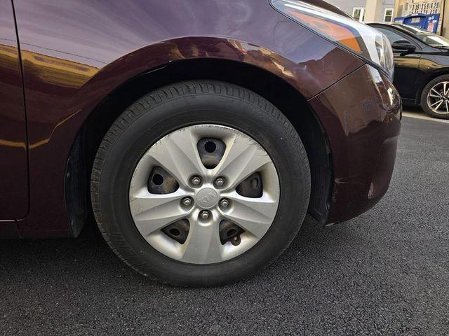 Photo of 2018 Garnet Red Kia Forte
