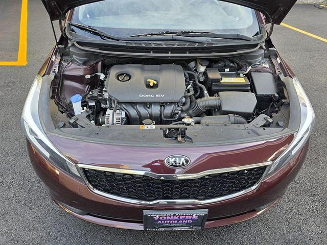 Photo of 2018 Garnet Red Kia Forte