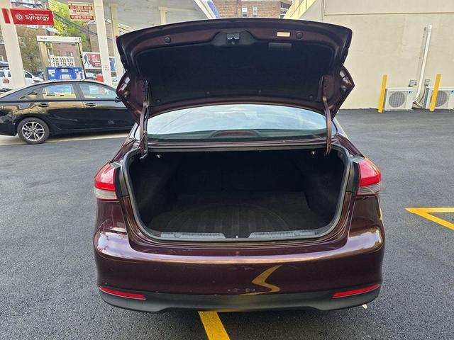 Photo of 2018 Garnet Red Kia Forte