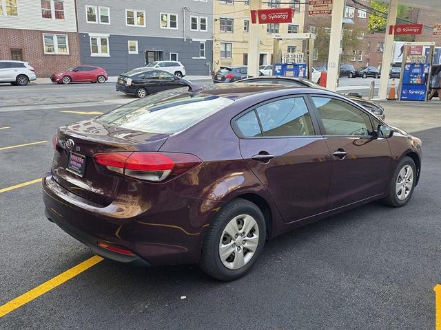 Photo of 2018 Garnet Red Kia Forte