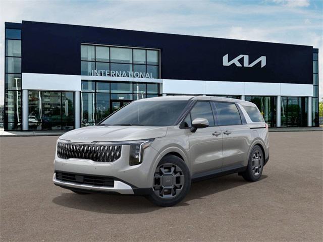 Photo of 2025 Ivory Silver Kia Carnival Hybrid