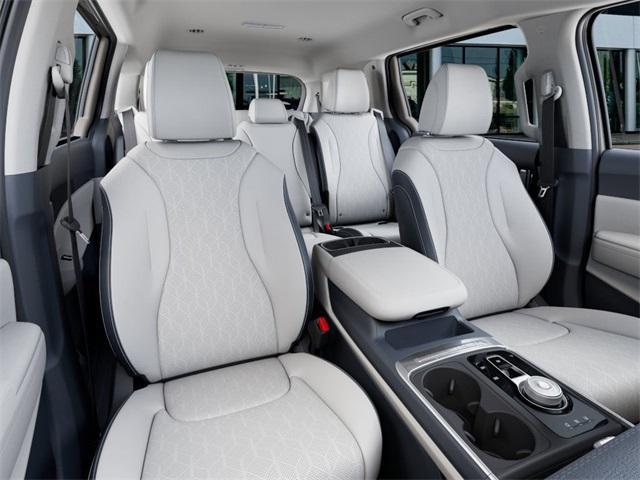 Photo of 2025 Ivory Silver Kia Carnival Hybrid
