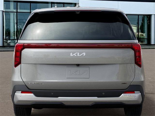 Photo of 2025 Ivory Silver Kia Carnival Hybrid
