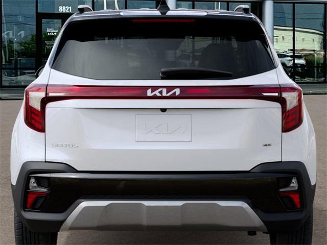 Photo of 2026 Clear White/Black Roof Kia Seltos