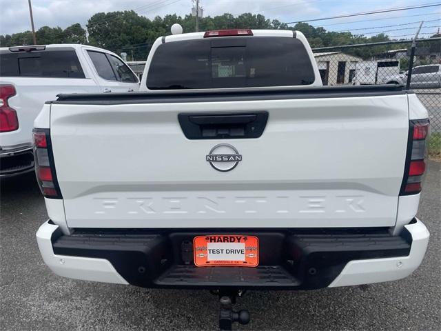 Photo of 2024 Glacier White Nissan Frontier