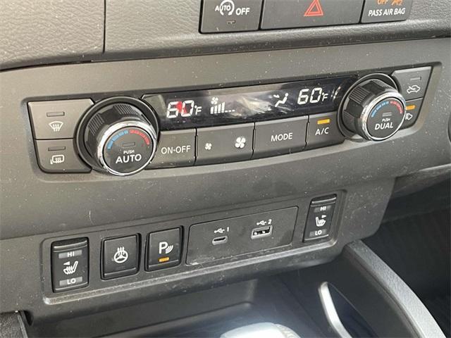 Photo of 2024 Glacier White Nissan Frontier