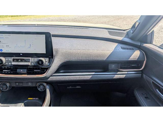 Photo of 2024 Coastal Cream Toyota Grand Highlander Hybrid