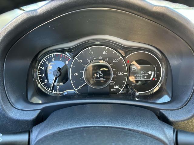 Photo of 2015 Metallic Peacock Nissan Versa Note