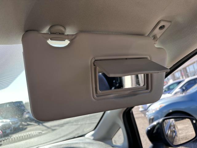 Photo of 2015 Metallic Peacock Nissan Versa Note