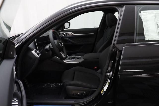 Photo of 2025 Black Sapphire Metallic BMW i4 Gran Coupe
