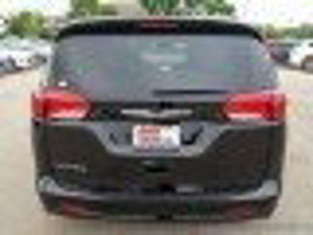 Photo of 2024 Diamond Black Chrysler Voyager