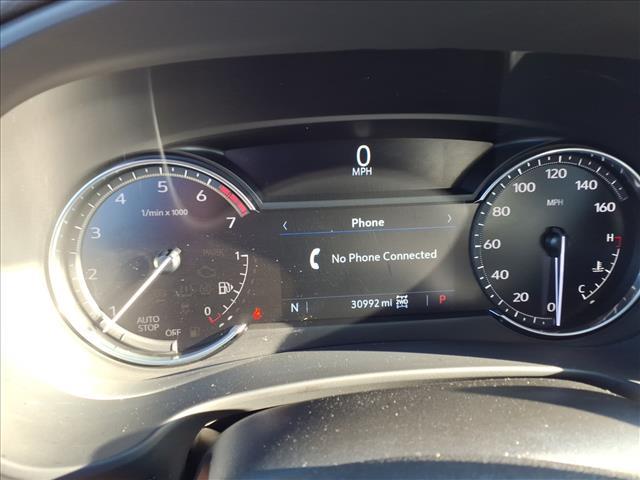 Photo of 2021 Crystal White Tri-Coat Cadillac XT4