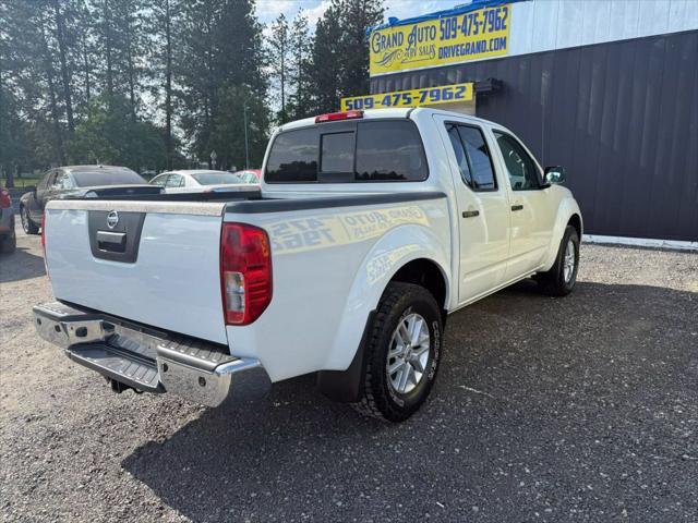 Photo of 2016 Glacier White Nissan Frontier