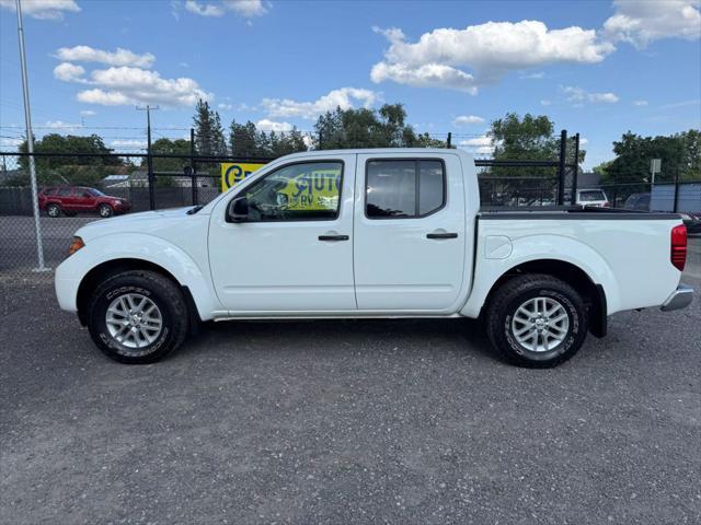 Photo of 2016 Glacier White Nissan Frontier