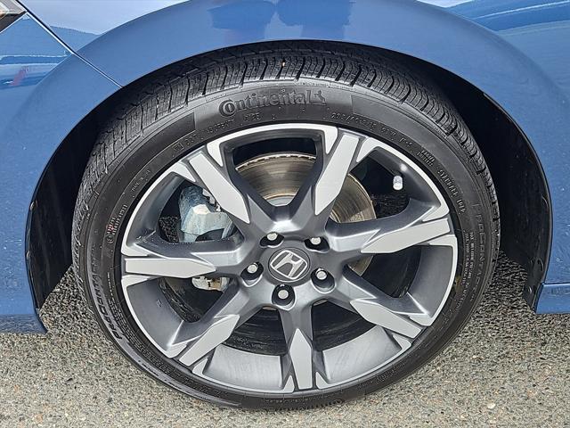 Photo of 2025 Blue Lagoon Pearl Honda Civic Hybrid