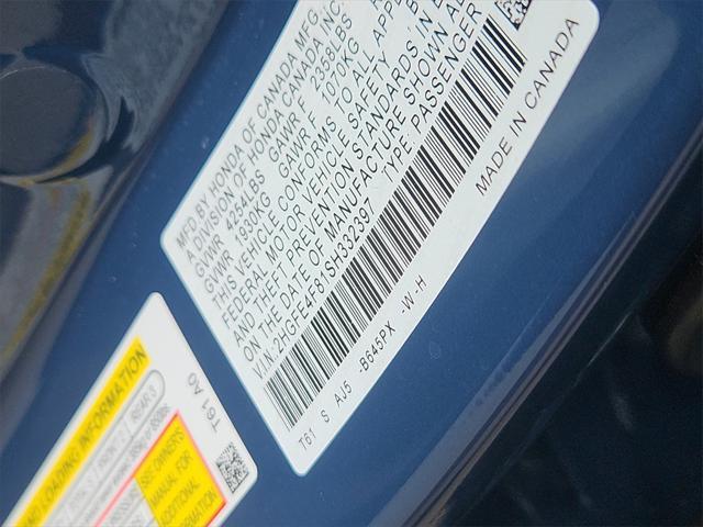 Photo of 2025 Blue Lagoon Pearl Honda Civic Hybrid
