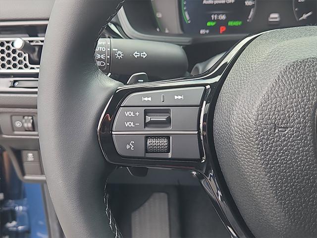 Photo of 2025 Blue Lagoon Pearl Honda Civic Hybrid
