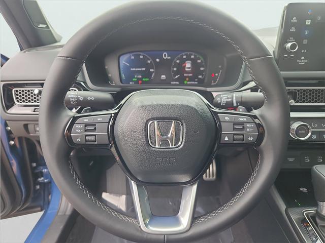 Photo of 2025 Blue Lagoon Pearl Honda Civic Hybrid