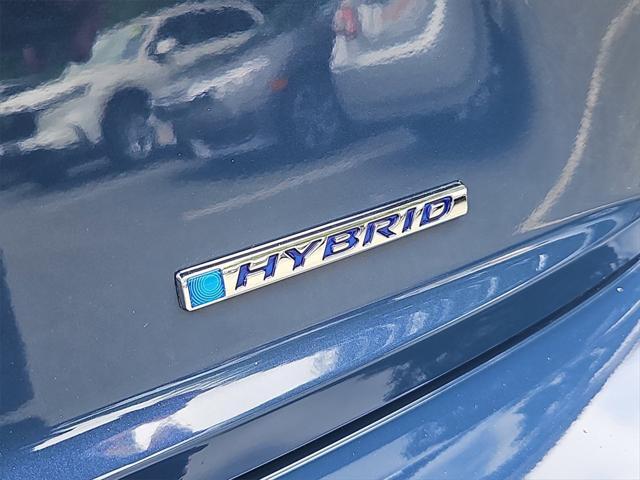 Photo of 2025 Blue Lagoon Pearl Honda Civic Hybrid