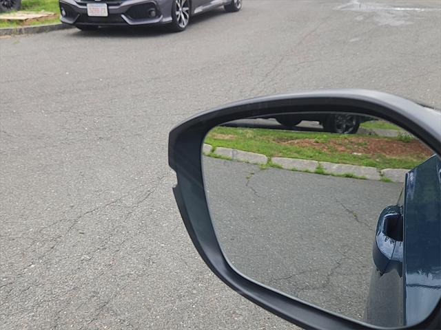 Photo of 2025 Blue Lagoon Pearl Honda Civic Hybrid