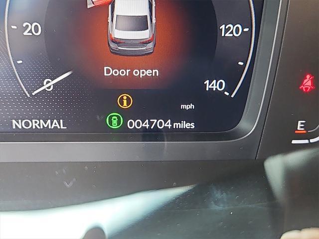 Photo of 2025 Blue Lagoon Pearl Honda Civic Hybrid