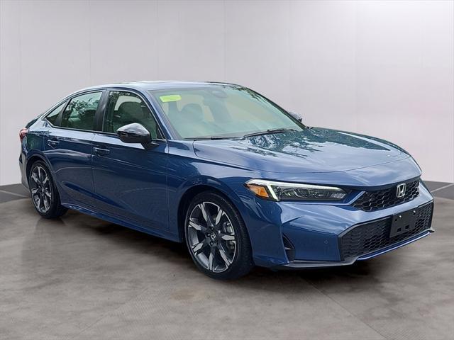Photo of 2025 Blue Lagoon Pearl Honda Civic Hybrid