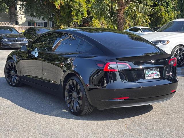Photo of 2022 Black Tesla Model 3