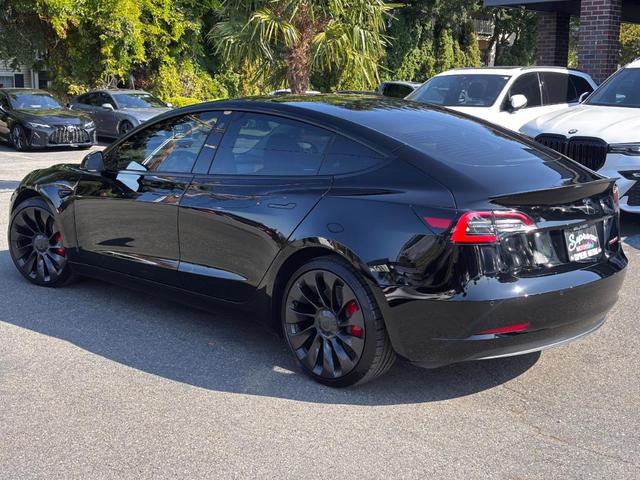 Photo of 2022 Black Tesla Model 3