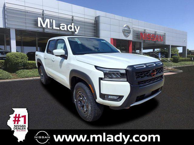 Photo of 2025 Glacier White Nissan Frontier