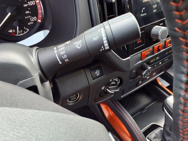 Photo of 2025 Glacier White Nissan Frontier