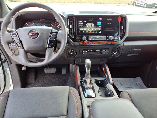 Photo of 2025 Glacier White Nissan Frontier